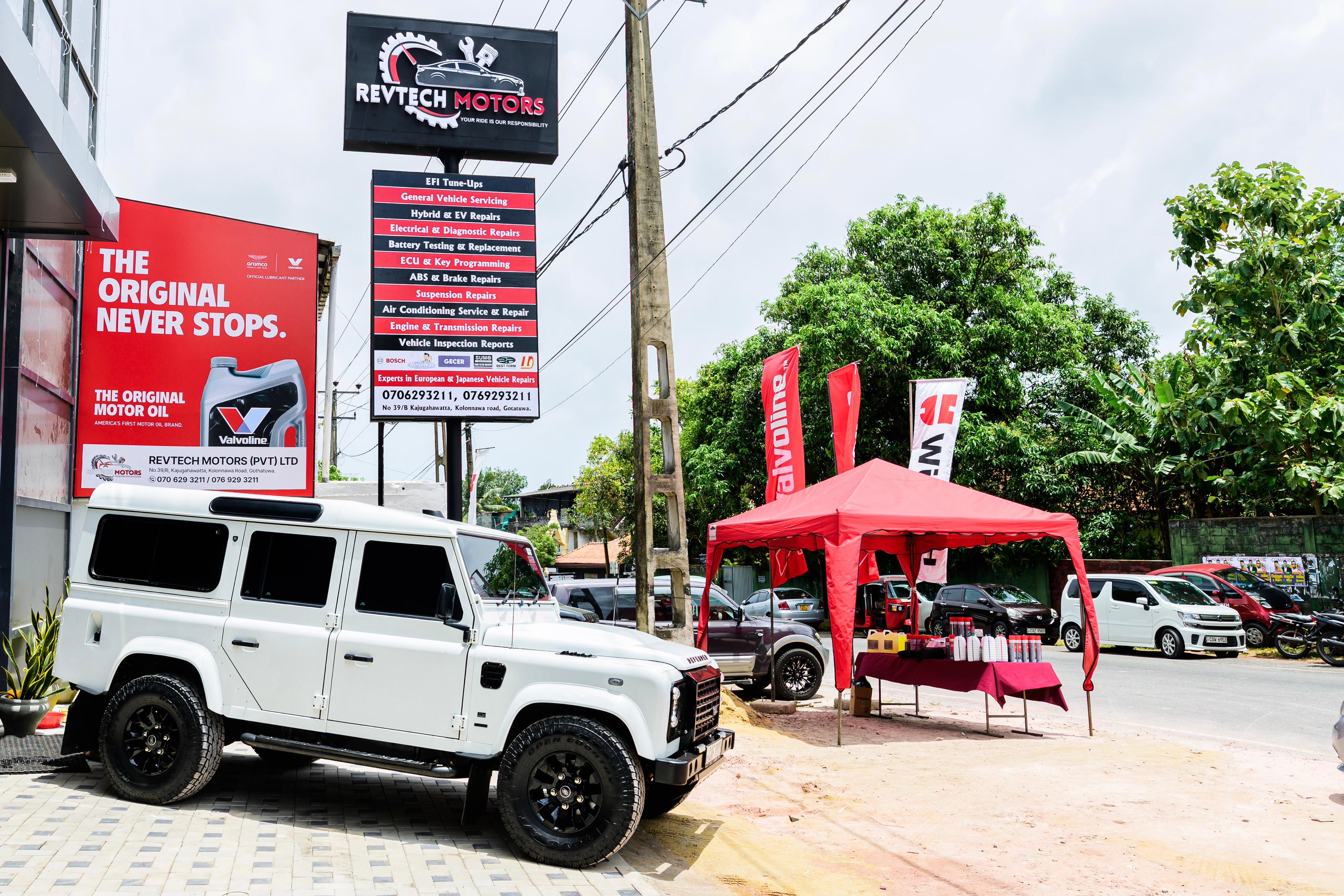 REVTECH Motors frontage and road-facing signage